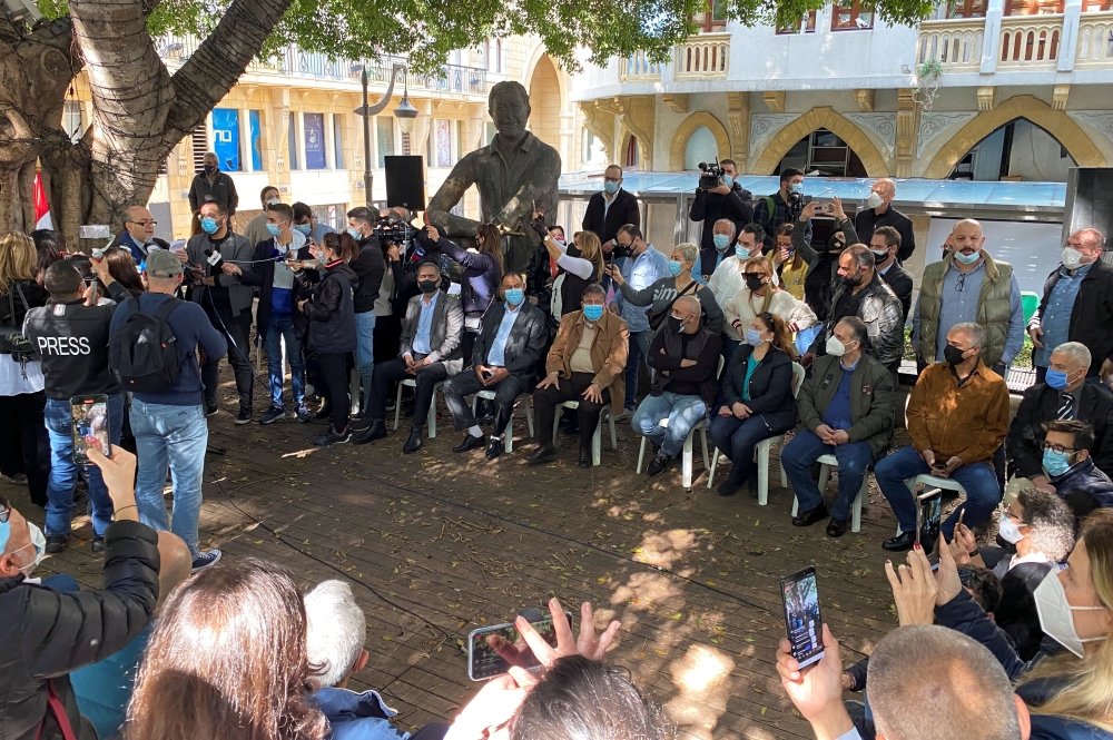 Activists gather two days after the killing of prominent Hezbollah critic Lokman Slim demanding a transparent investigation into the crime, in downtown Beirut, Lebanon February 6, 2021. REUTERS/Mohamed Azakir
