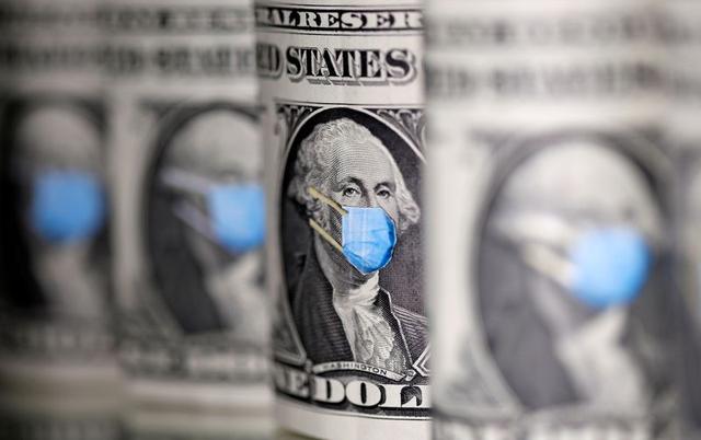 FILE PHOTO: George Washington is seen with printed medical mask on the one Dollar banknotes in this illustration taken, March 31, 2020. REUTERS/Dado Ruvic/Illustration
