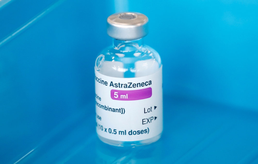 A vail of the Oxford-AstraZeneca COVID-19 vaccine is seen at Basingstoke Fire Station, in Basingstoke, Britain February 4, 2021. REUTERS/Peter Cziborra/File Photo