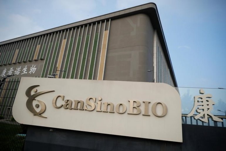 FILE PHOTO: A logo of China's vaccine specialist CanSino Biologics Inc is pictured on the company's headquarters in Tianjin, following an outbreak of the coronavirus disease (COVID-19), China August 17, 2020. REUTERS/Thomas Peter