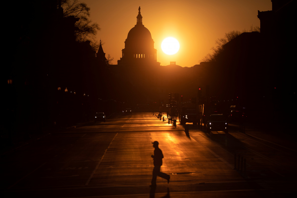 The sun rises over the U.S. Capitol ahead of former U.S. President Donald Trump's second Impeachment trial in Washington, U.S., February 8, 2021. REUTERS/Tom Brenner
