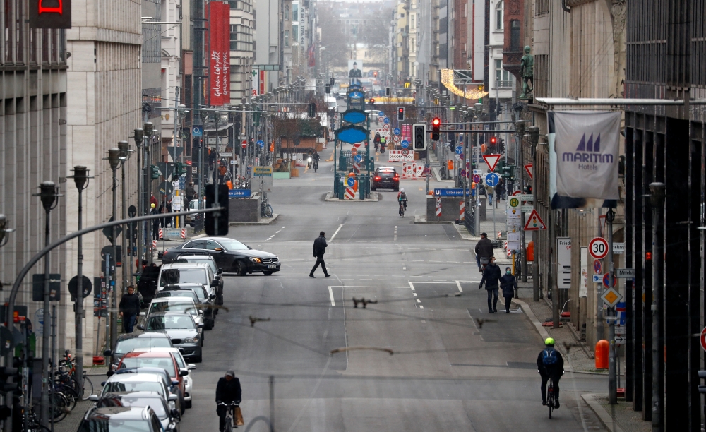 A general view shows an almost empty Friedrichstrasse boulevard, one of the city's best known shopping zones, during lockdown amid the coronavirus disease (COVID-19) pandemic, in Berlin, Germany, February 5, 2021. REUTERS/Fabrizio Bensch