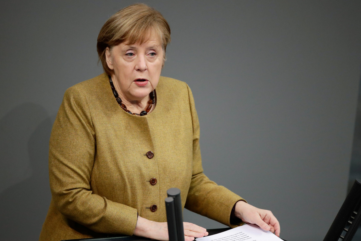 German Chancellor Angela Merkel delivers a speech on the government's response to the coronavirus disease (COVID-19) pandemic, at the country's parliament, the Bundestag, in Berlin, Germany, February 11, 2021. REUTERS/Hannibal Hanschke
