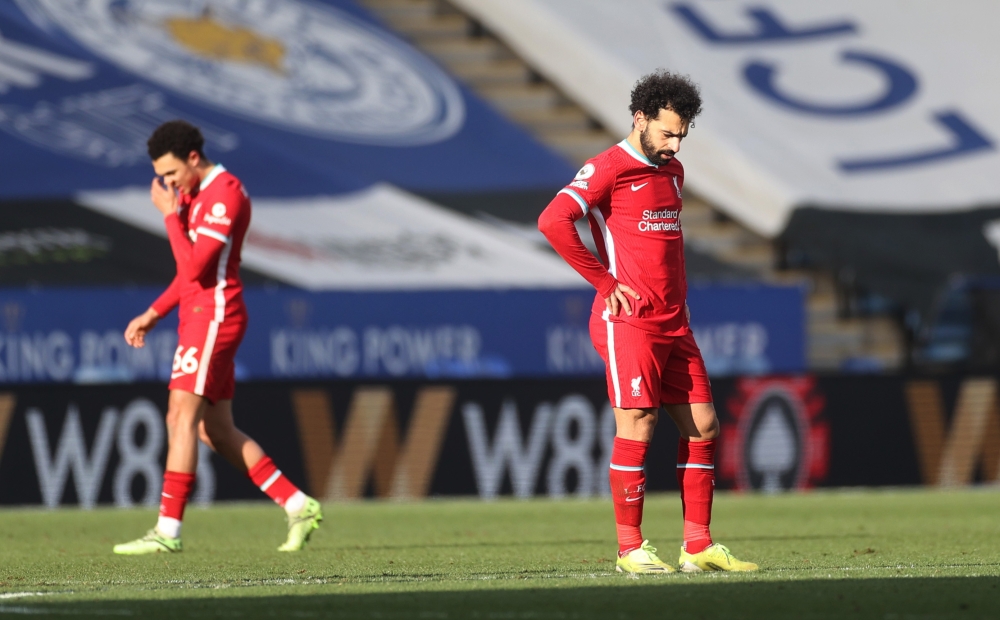 Liverpool's Mohamed Salah reacts after Leicester City's Harvey Barnes scores their third goal Pool via REUTERS/Carl Recine