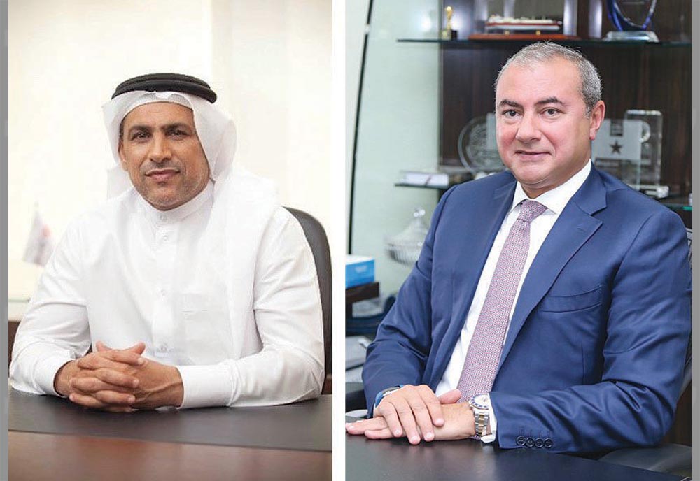 Abdul Hakeem Mostafawi (left), CEO of HSBC Qatar, and Bassel Gamal, Group CEO of QIB.