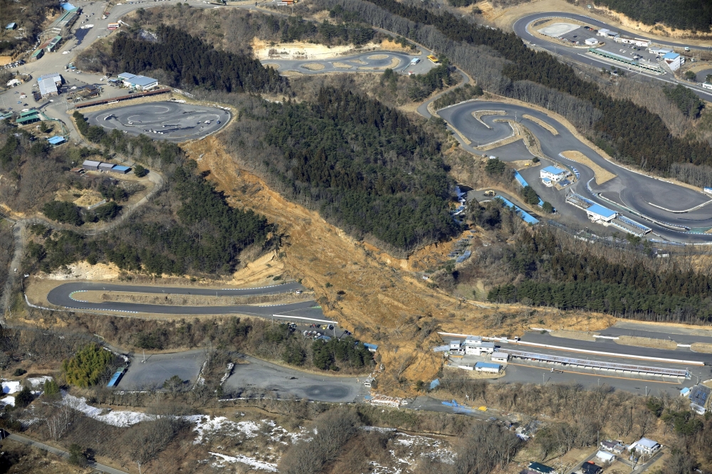 An aerial view shows a landslide caused by a strong earthquake is seen on a circuit course in Nihonmatsu, Fukushima Prefecture, Japan on February 14, 2021 in this photo taken by Kyodo. Mandatory credit Kyodo/via REUTERS