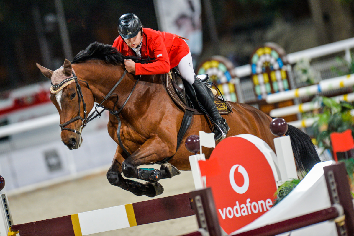 Kami Sabitov of Kyrgyzstan guiding Quintendro over a hurdle during 2020 Amir’s Sword Festival in this file photo. 