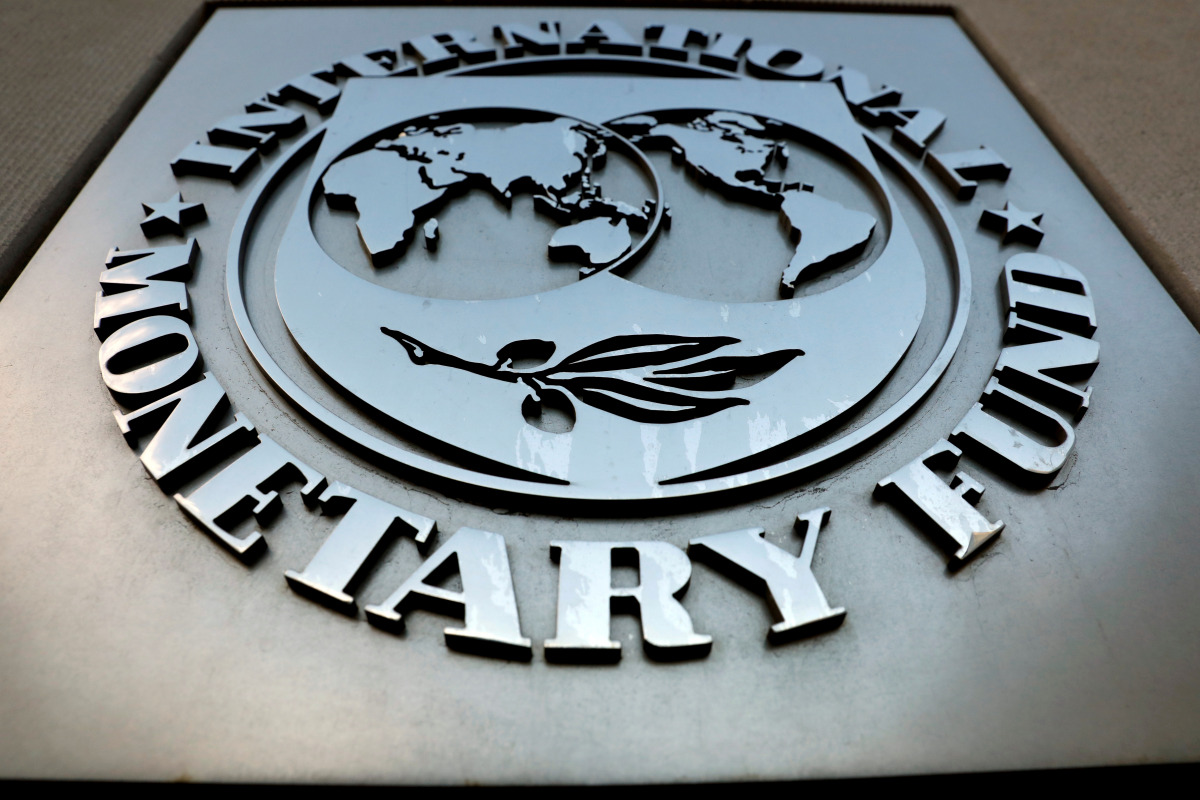 FILE PHOTO: The International Monetary Fund (IMF) logo is seen outside the headquarters building in Washington, U.S., September 4, 2018. REUTERS/Yuri Gripas/File Photo
