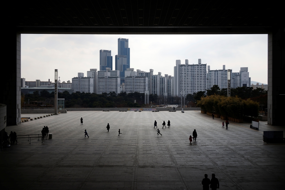People enjoy a moment, amid the coronavirus disease (COVID-19) pandemic, at the National Museum of Korea in Seoul, South Korea, February 19, 2021. REUTERS/Kim Hong-Ji