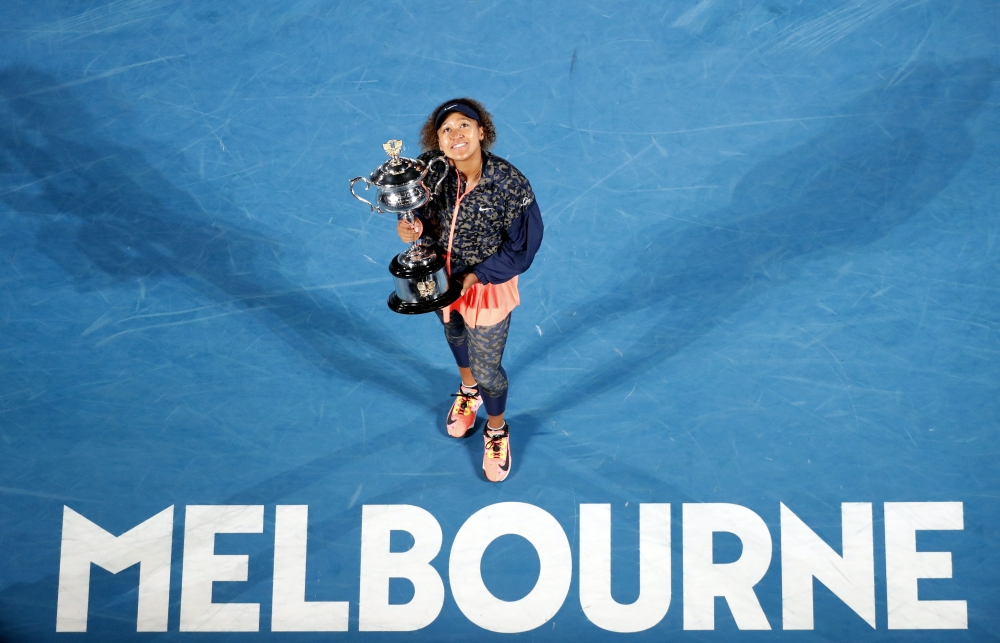  Japan's Naomi Osaka celebrates with the trophy after winning her final match against Jennifer Brady of the US Reuters/Asanka Brendon Ratnayake