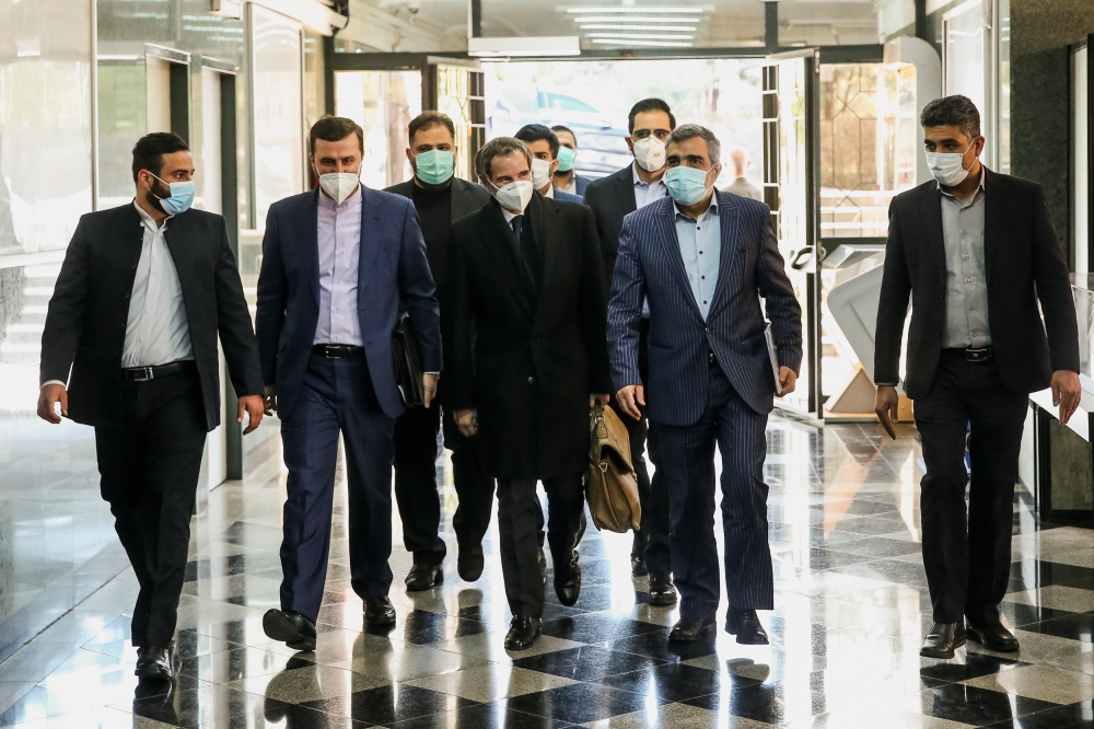 :International Atomic Energy Agency (IAEA) Director General Rafael Grossi walks during a meeting with head of Iran's Atomic Energy Organization Ali-Akbar Salehi, in Tehran, Iran February 21, 2021. Hadi Zand/WANA 
