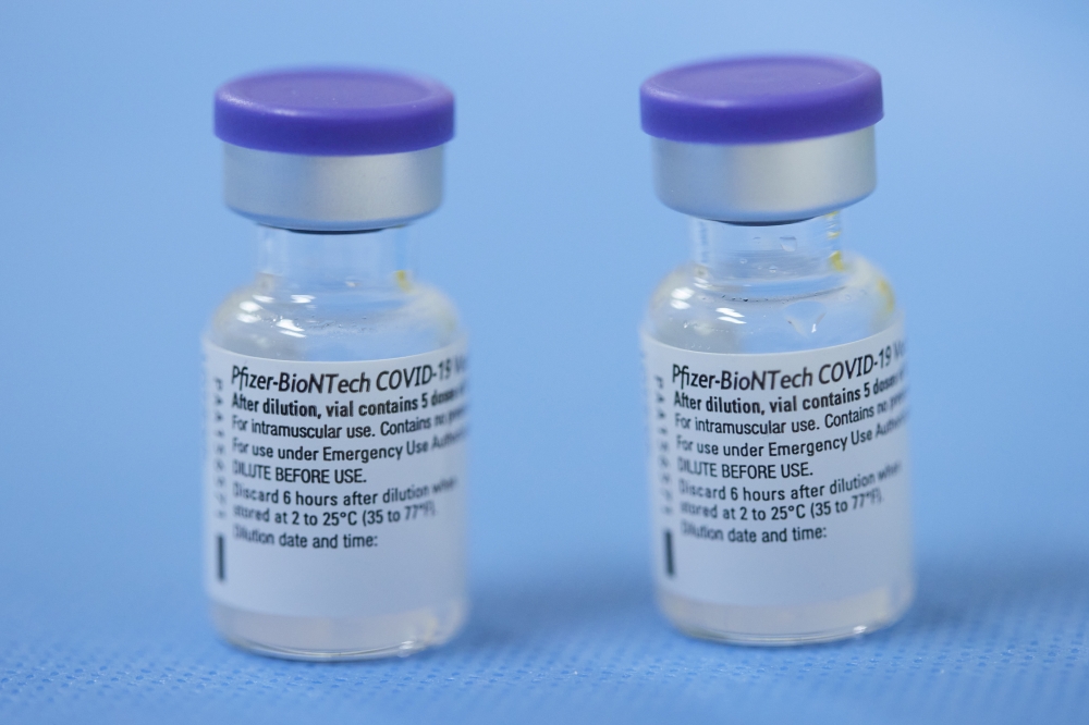 Vials of the Pfizer-BioNTech vaccine are pictured in a vaccination centre in Geneva, Switzerland, February 3, 2021. Reuters/Denis Balibouse/File Photo