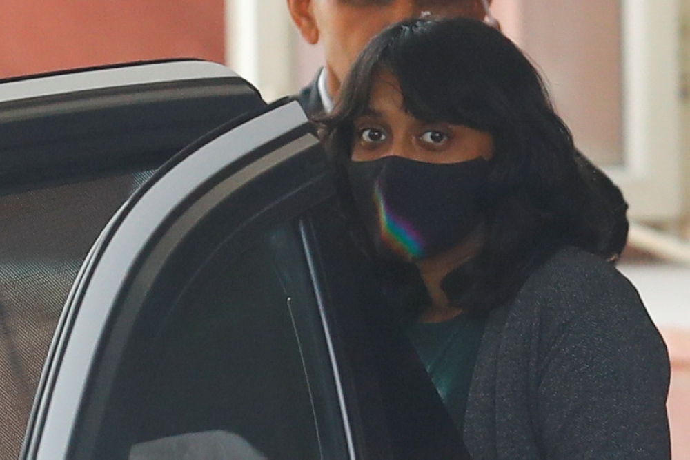 Disha Ravi, a 22-year-old climate activist, leaves after an investigation at National Cyber Forensic Lab, in New Delhi, India, February 23, 2021. REUTERS/Adnan Abidi
