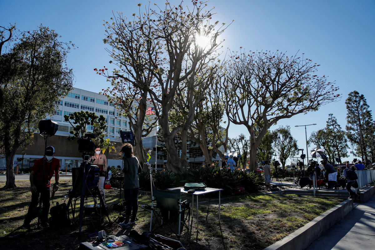 Members of the media are seen outside the Harbor-UCLA Medical Center in Torrance, California, U.S., where golfer Tiger Woods was taken to following a car crash, February 23, 2021. REUTERS/Mike Blake