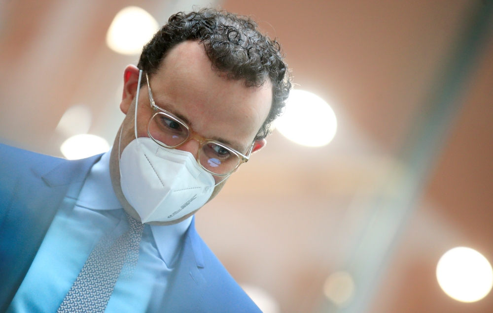 Germany's Health Minister Jens Spahn wears a mask following a news conference on the coronavirus disease (COVID-19) pandemic in Berlin, Germany February 26, 2021. REUTERS/Hannibal Hanschke/Pool