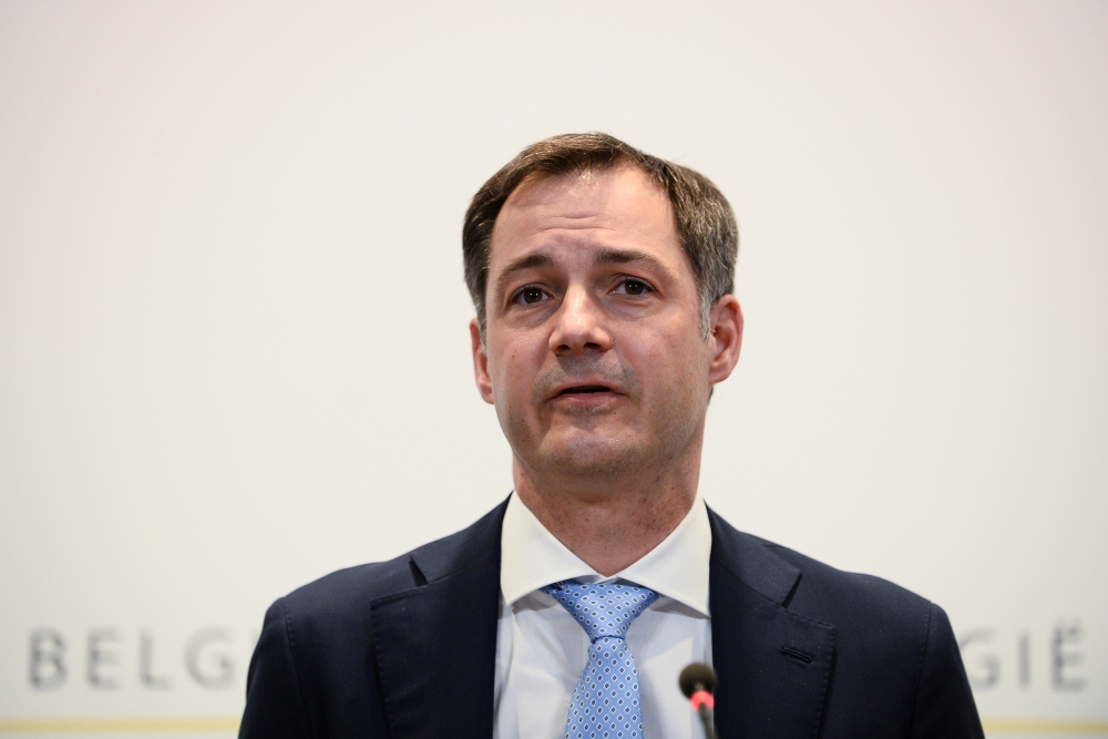 Belgium's Prime Minister Alexander De Croo speaks at a news conference after a government meeting to announce new coronavirus disease (COVID-19) related restrictions in Brussels, Belgium February 26, 2021. REUTERS/Johanna Geron/Pool