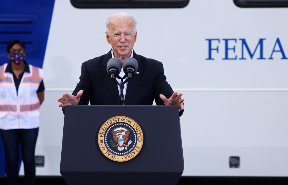 US President Joe Biden speaks after touring a Federal Emergency Management Agency (FEMA) vaccination facility for the coronavirus disease (COVID-19) at NRG Stadium in Houston, Texas, US, February 26, 2021. Reuters/Jonathan Ernst