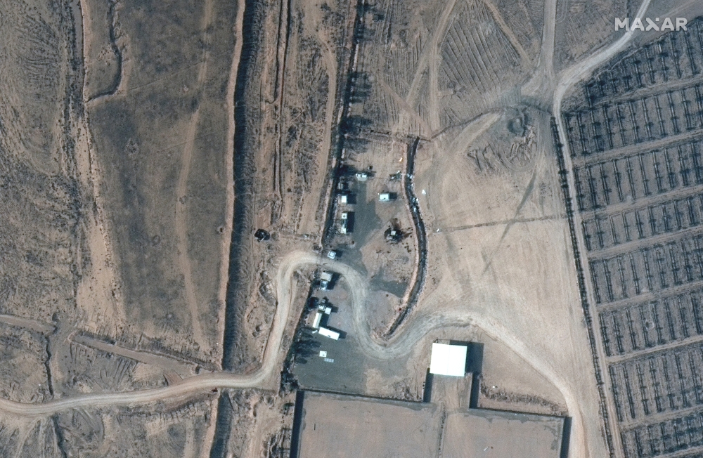 A close up view of buildings at an Iraq-Syria border crossing before airstrikes, seen in this February 3, 2021 handout satellite image provided by Maxar.  
