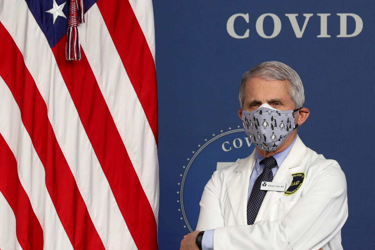 National Institute of Allergy and Infectious Diseases Director Dr. Anthony Fauci stands by during an event to commemorate the 50 millionth coronavirus disease (COVID-19) vaccination in the South Court Auditorium at the White House in Washington, U.S., Feb