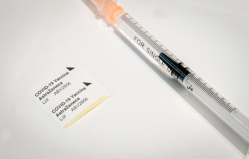 FILE PHOTO: A syringe for the AstraZeneca's COVID-19 vaccine is pictured during the opening of a vaccination centre at Berlin's former Tegel TXL airport, amid the spread of the coronavirus disease (COVID-19), in Berlin, Germany, February 10, 2021. Kay Nie