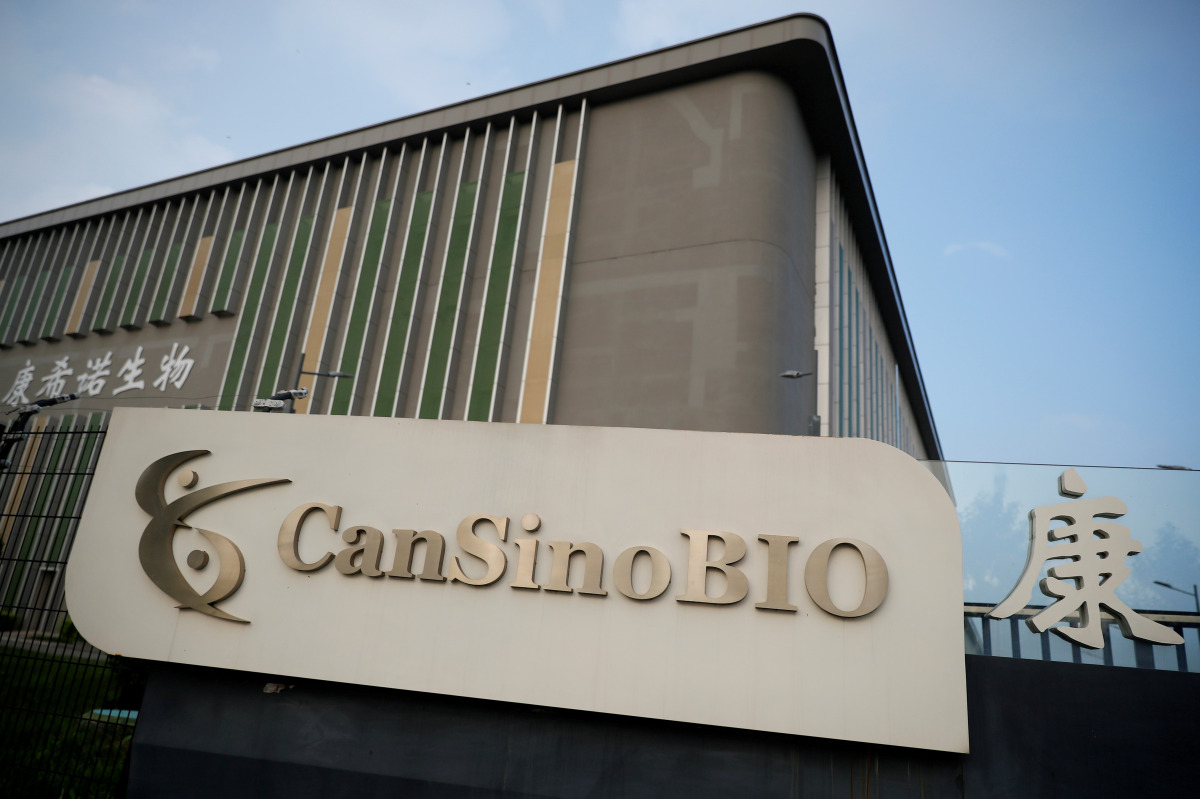 FILE PHOTO: A logo of China's vaccine specialist CanSino Biologics Inc is pictured on the company's headquarters in Tianjin, China August 17, 2020. REUTERS/Thomas Peter/File Photo
