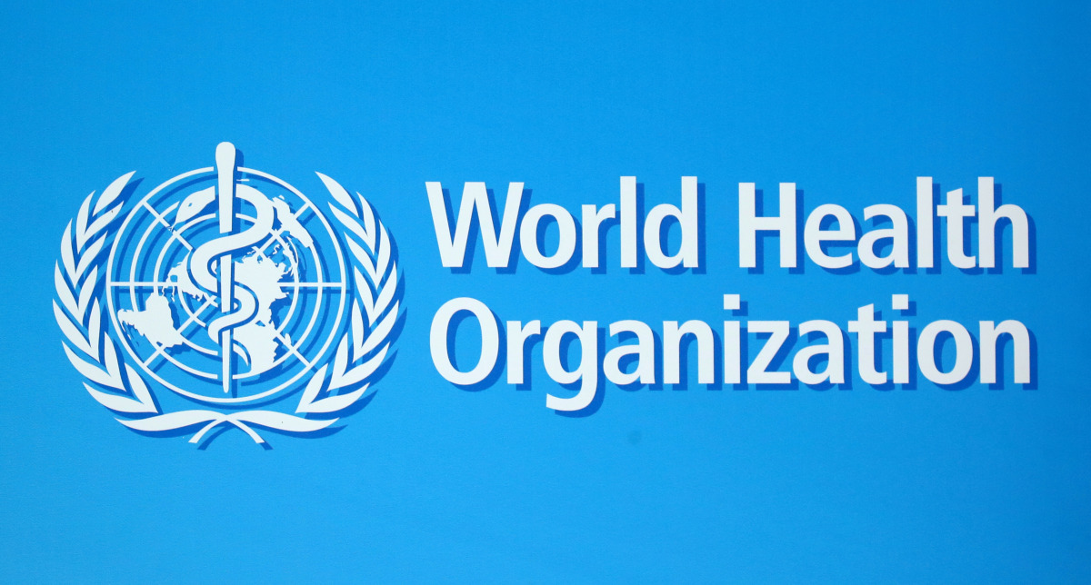FILE PHOTO: A logo of the World Health Organization (WHO), is seen before a news conference in Geneva, Switzerland, June 25, 2020. REUTERS/Denis Balibouse/File Photo
