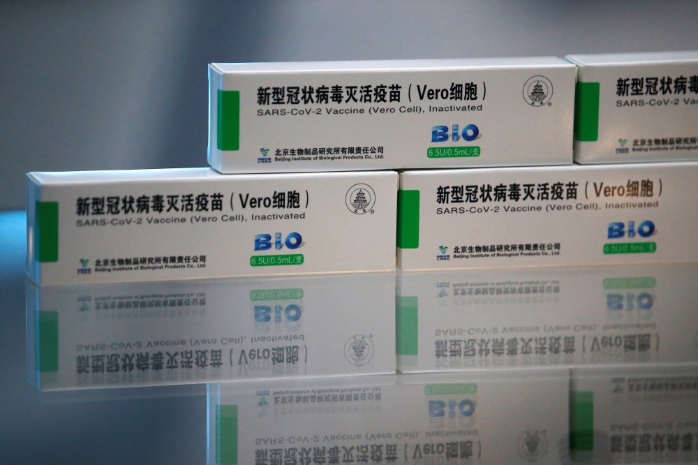 Packages of COVID-19 vaccines by Beijing Institute of Biological Products of Sinopharm's China National Biotec Group (CNBG), are displayed during a government-organised visit to the vaccine’s production line in Beijing, China February 26, 2021. REUTERS/Ti