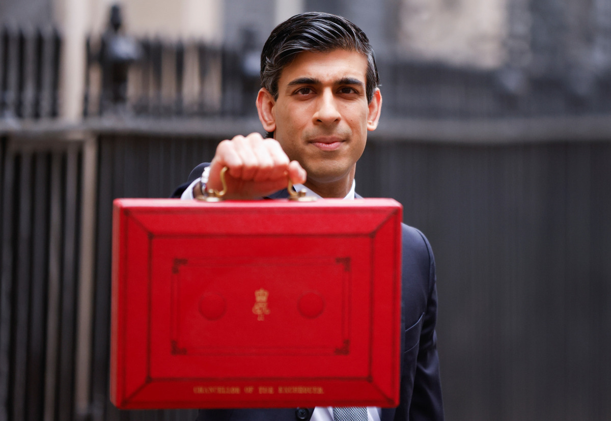 Britain's Chancellor of the Exchequer Rishi Sunak holds the budget box outside his office in Downing Street in London, Britain March 3, 2021. REUTERS/John Sibley
