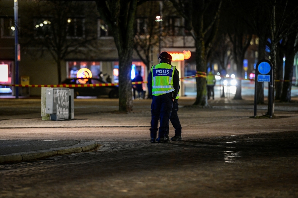 Police work at a knife attack site in Vetlanda, Sweden March 3, 2021. TT News Agency/Mikael Fritzon via REUTERS 