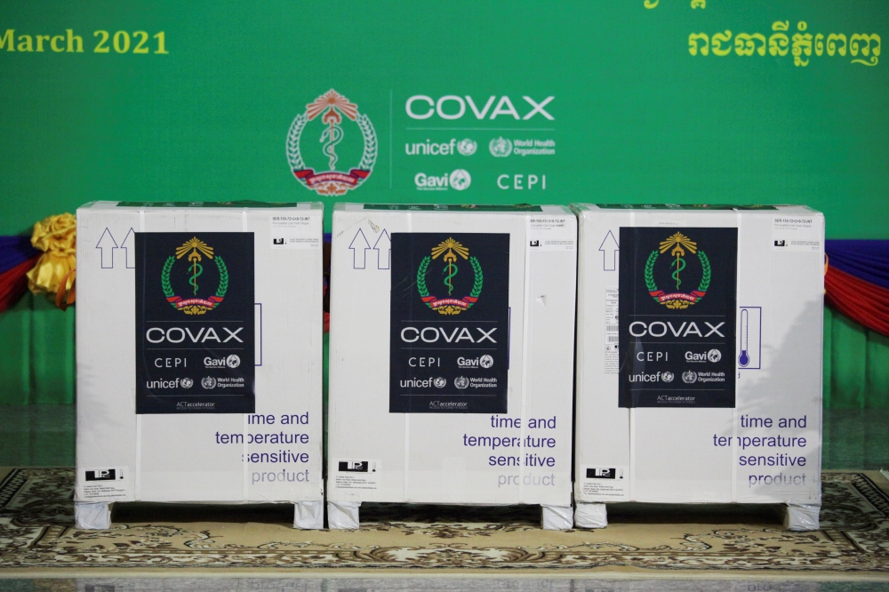 Containers of Oxford/AstraZeneca vaccines are pictured during a handover ceremony as the country receives its coronavirus disease (COVID-19) vaccines under COVAX scheme at the Phnom Penh International Airport, Cambodia, March 2, 2021. REUTERS/Cindy Liu