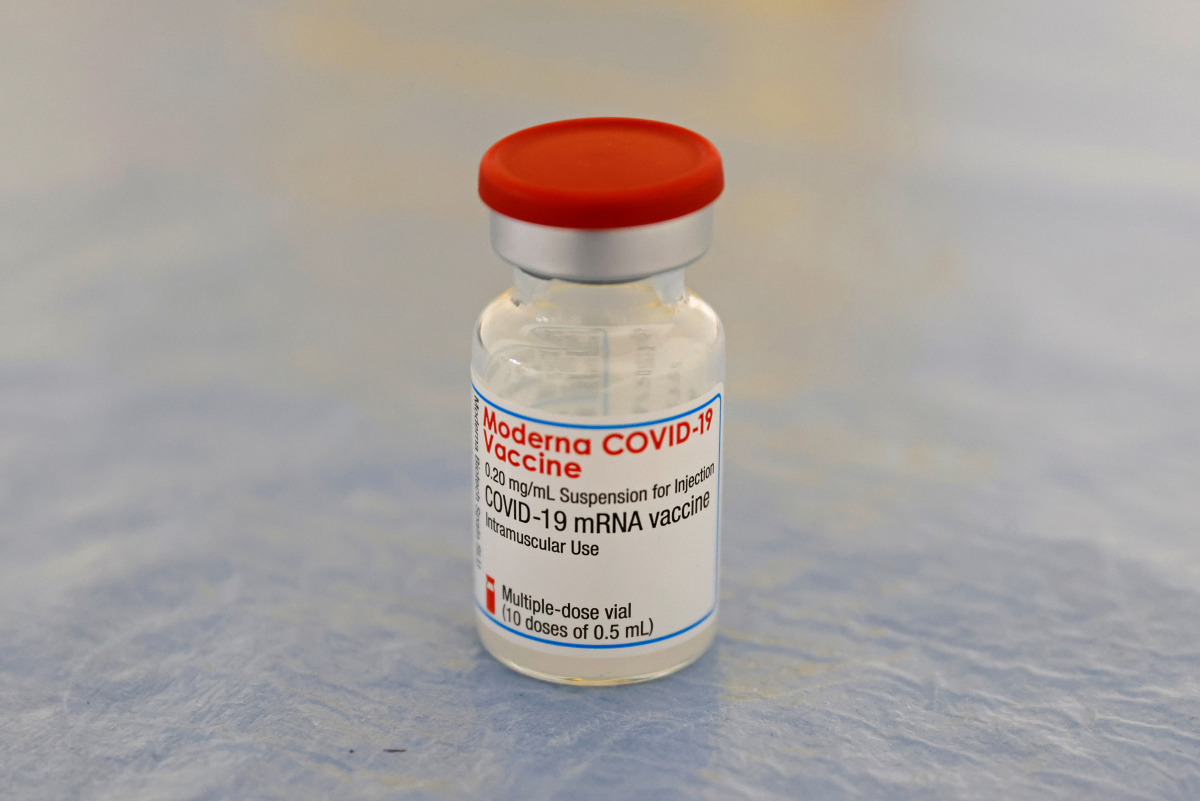 A vial of the Moderna COVID-19 vaccine is seen at a vaccination center in Calais as part of the coronavirus disease (COVID-19) vaccination campaign in France, March 4, 2021. REUTERS/Pascal Rossignol
