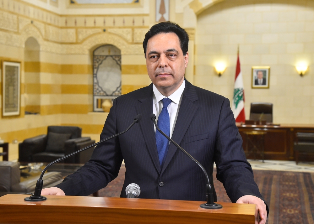 Lebanon's caretaker Prime Minister Hassan Diab speaks at the government palace in Beirut, Lebanon March 6, 2021. Dalati Nohra