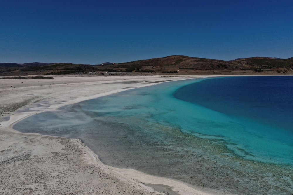 A general view of Salda Lake in Burdur province, Turkey, March 1, 2021. The official Twitter account of NASA Earth mentioned lake Salda in their tweet a day before NASA rover Perseverance touched down on Mars. Picture taken with a drone on March 1, 2021. 