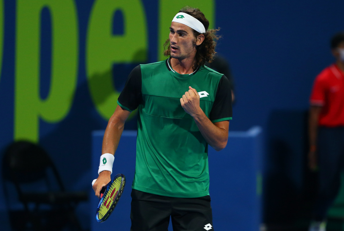 Lloyd Harris of South Africa celebrates a match point during his round one match against Stan Wawrinka of Switzerland on Day 2 of the Qatar ExxonMobil Open 2021 at Khalifa International Tennis and Squash Complex, yesterday.