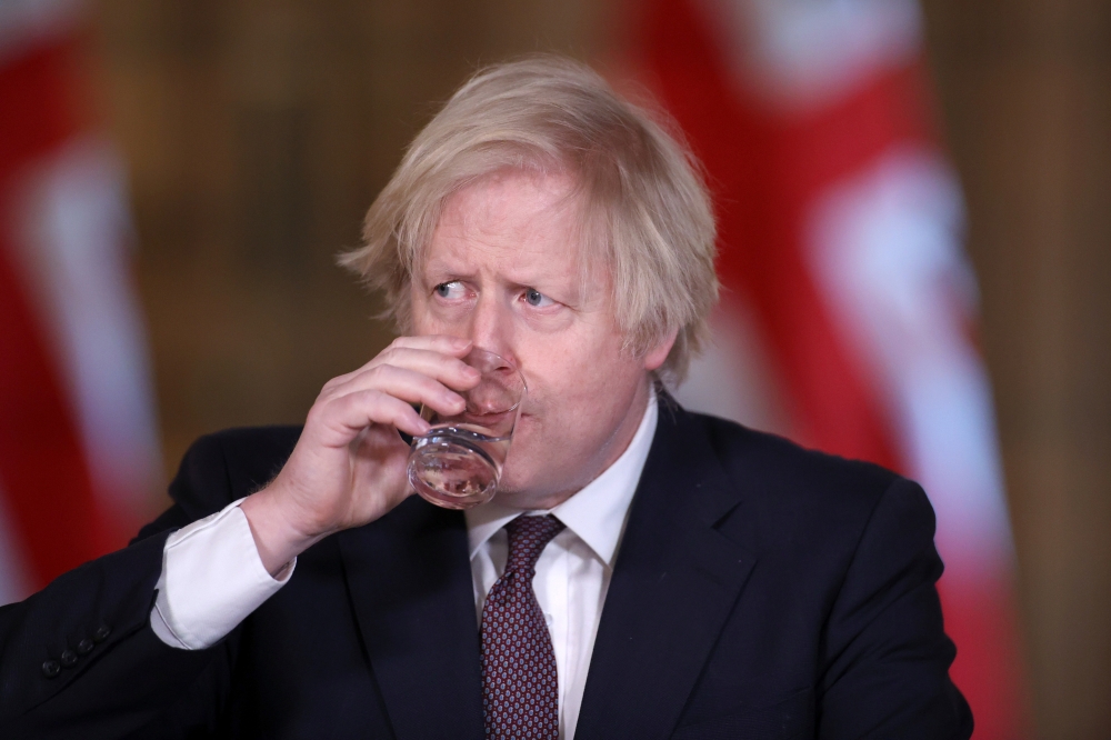 Britain's Prime Minister Boris Johnson holds a virtual news conference at 10 Downing Street, amid the coronavirus disease (COVID-19) outbreak, in London, Britain, March 8, 2021. Reuters/Hannah Mckay/Pool