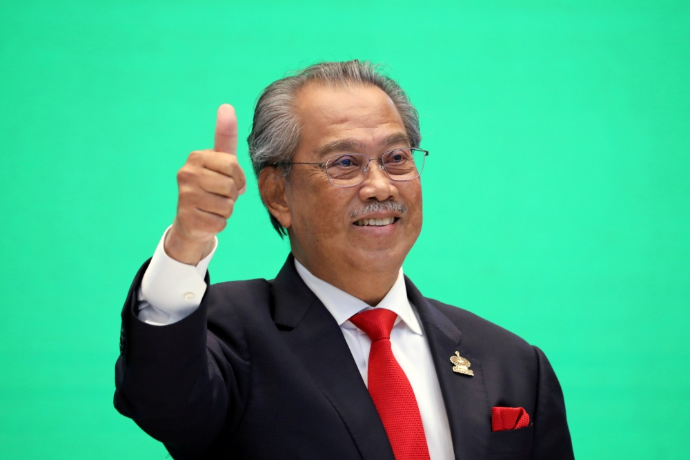 Malaysia's Prime Minister Muhyiddin Yassin gestures during virtual APEC Economic Leaders Meeting 2020, in Kuala Lumpur, Malaysia November 20, 2020. REUTERS/Lim Huey Teng/File Photo