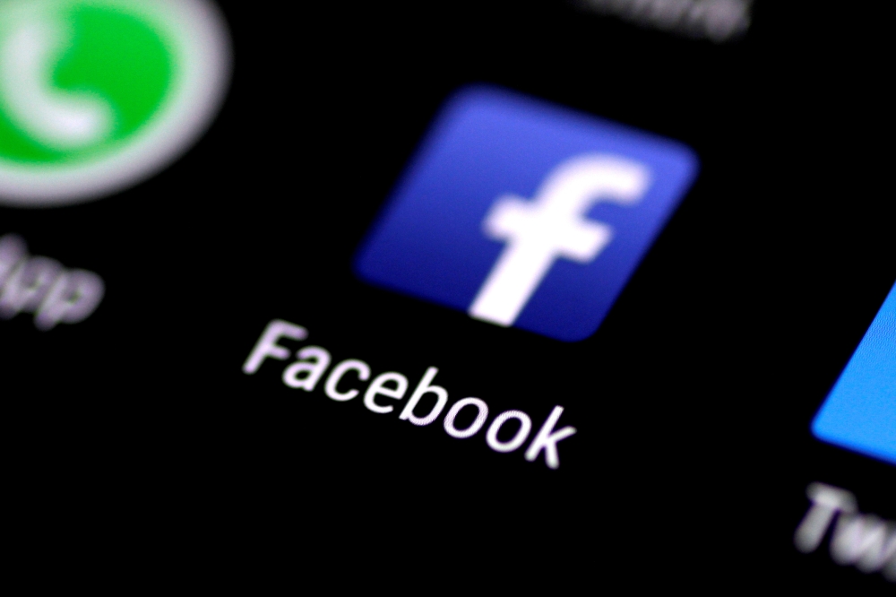 The Facebook application is seen on a phone screen August 3, 2017. REUTERS/Thomas White/File Photo/File Photo