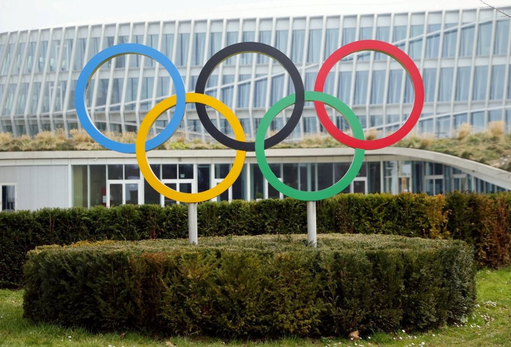 The Olympic rings are pictured in front of the International Olympic Committee (IOC) headquarters in Lausanne, Switzerland, March 9, 2021. REUTERS/Denis?Balibouse/File Photo