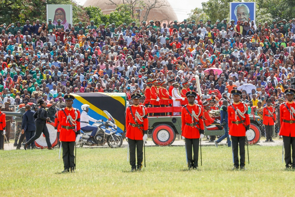 Military officers escort a gun carriage carrying the coffin of late Tanzanian President John Magufuli draped in the national flag, during the State Funeral Procession at the Jamhuri Stadium in Dodoma, Tanzania March 22, 2021. Presidential Press Service/Ha