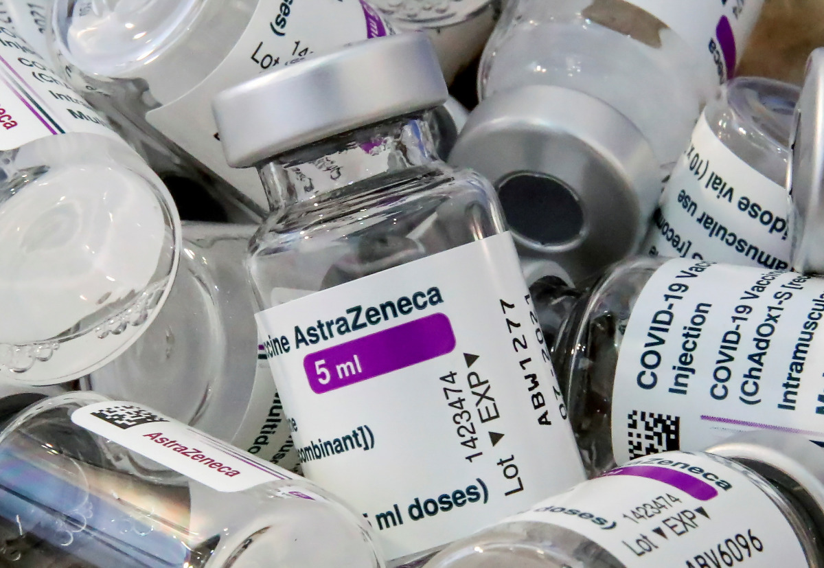 FILE PHOTO: Empty vials of Oxford/AstraZeneca's COVID-19 vaccine are pictured amid a vaccination campaign in Bierset, Belgium March 17, 2021. REUTERS/Yves Herman/File Photo
