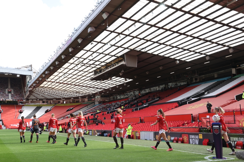 Manchester United players walk out before the match Action Images via Reuters/Carl Recine