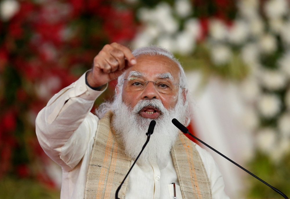 FILE PHOTO: India's Prime Minister Narendra Modi addresses a gathering before flagging off the 