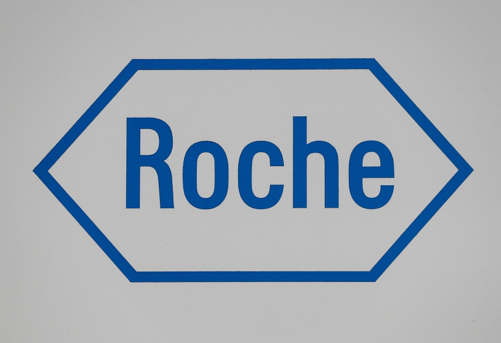 A sign at a diagnostics site for Swiss pharmaceutical giant Roche is seen, in Burgess Hill, Britain, October 7, 2020. REUTERS/Peter Nicholls/File Photo