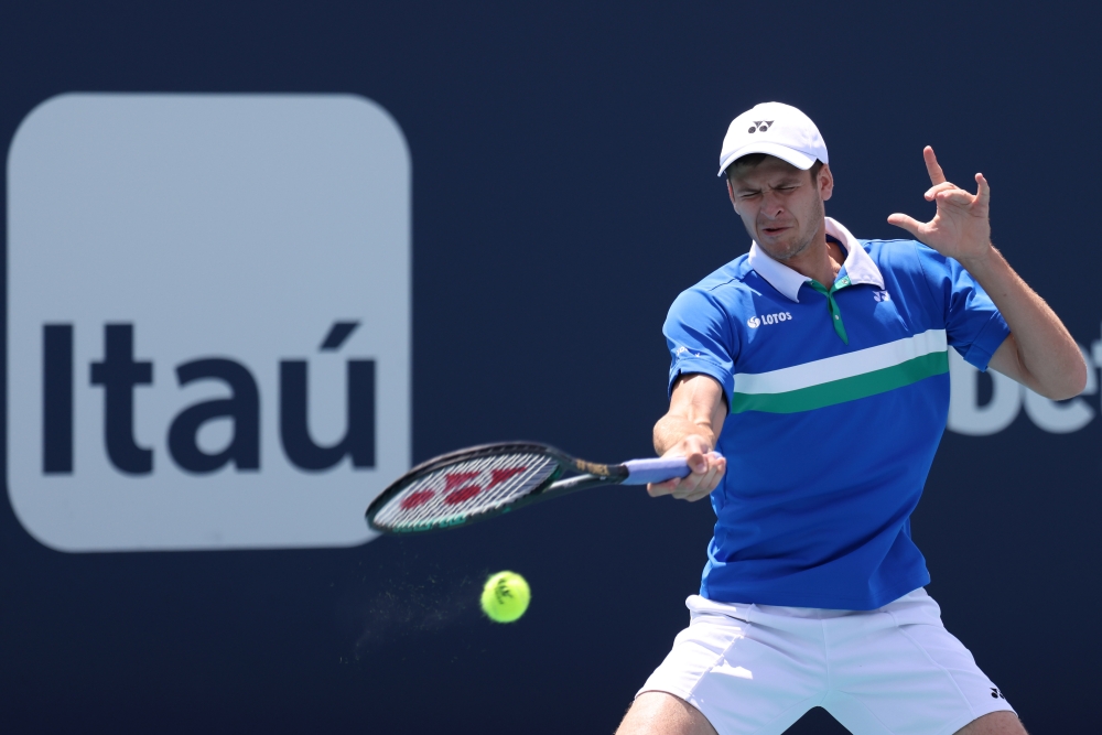 Hubert Hurkacz of Poland hits a forehand against Jannik Sinner of Italy (not pictured) in the men's singles final in the Miami Open at Hard Rock Stadium. Geoff Burke-USA TODAY Sports
