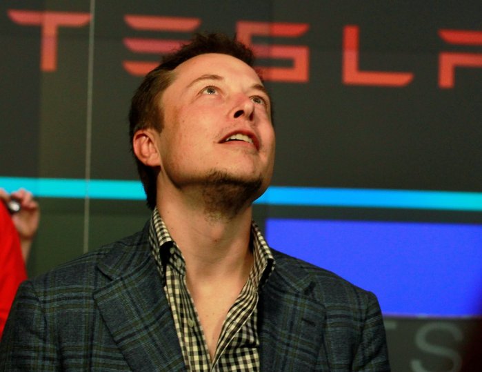 CEO of Tesla Motors Elon Musk reacts following the company's initial public offering at the NASDAQ market in New York June 29, 2010. REUTERS/Brendan McDermid/File Photo/File Photo
