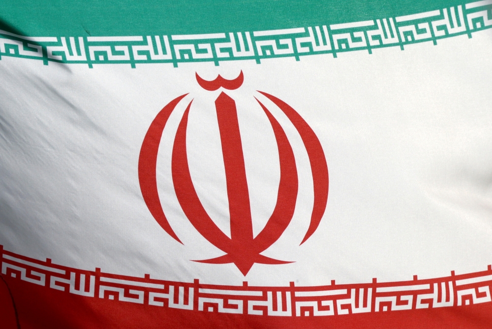 The Iranian flag waves in front of the International Atomic Energy Agency (IAEA) headquarters in Vienna, Austria, March 1, 2021. Reuters/Lisi Niesner/File Photo/File Photo