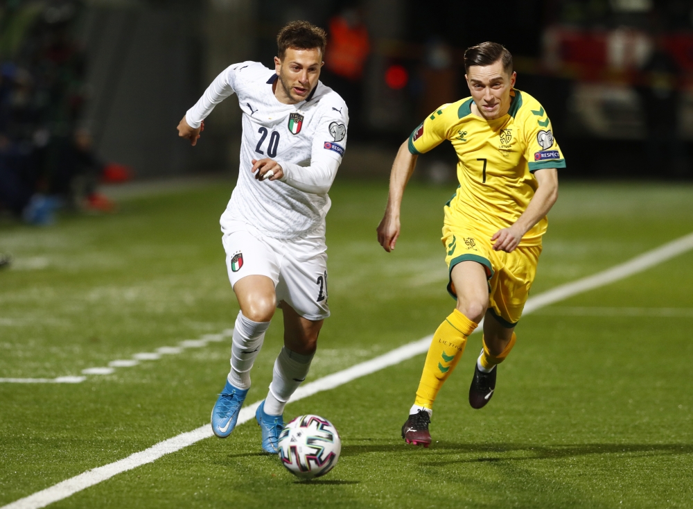 Italy's Federico Bernardeschi in action with Lithuania's Gratas Sirgedas REUTERS/Ints Kalnins
