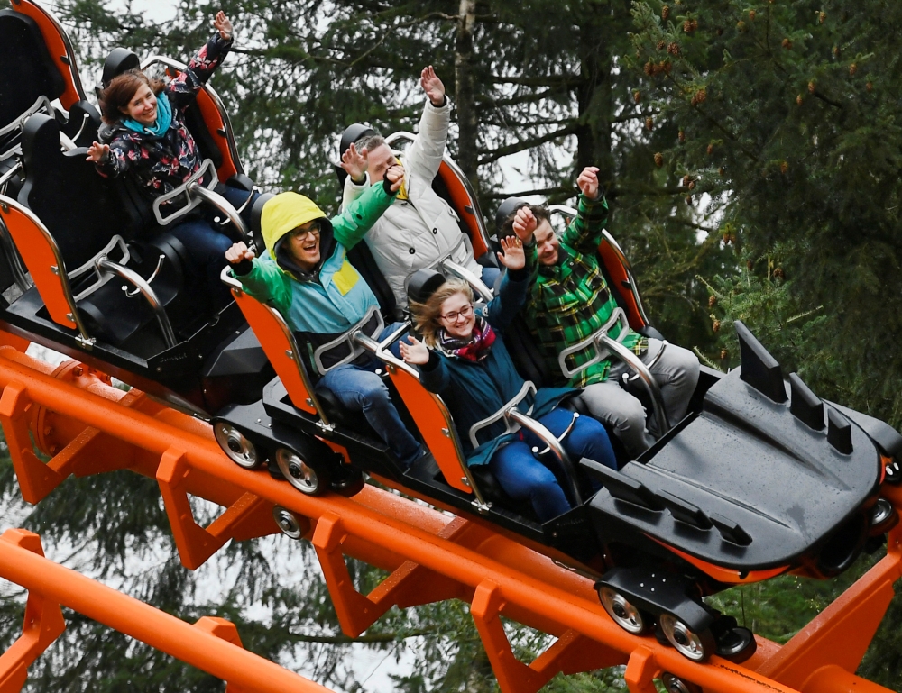 People visit Hellendoorn theme park as part of an experiment by the government to test how the tourism, hospitality and culture sectors could open up again after the coronavirus disease (COVID-19) lockdown restrictions, in Hellendoorn, Netherlands April 1