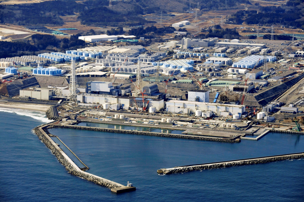 An aerial view shows the storage tanks for treated water at the tsunami-crippled Fukushima Daiichi nuclear power plant in Okuma town, Fukushima prefecture, Japan February 13, 2021, in this photo taken by Kyodo. Picture taken February 13, 2021. Kyodo/via R