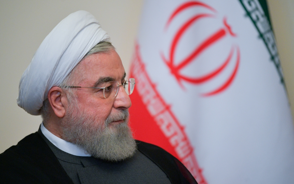 FILE PHOTO: Iranian President Hassan Rouhani attends a meeting with Russian President Vladimir Putin on the sidelines of a session of the Supreme Eurasian Economic Council In Yerevan, Armenia October 1, 2019. 